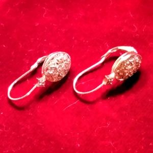 Diamond accented Filiree oval Lever back sterling silver earring